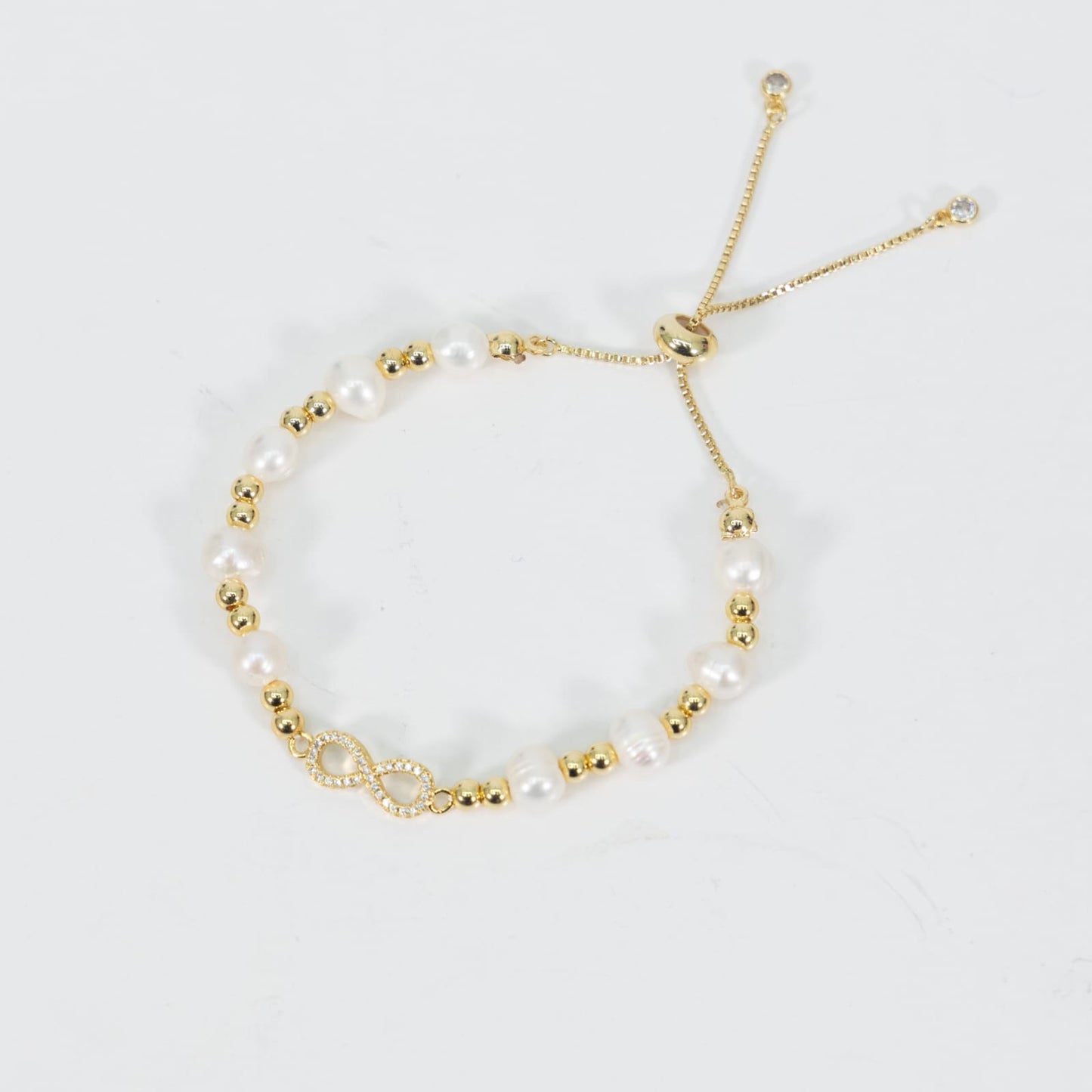 Pulsera De Infinito Ajustable Stainless Steel Con Perla Blanca